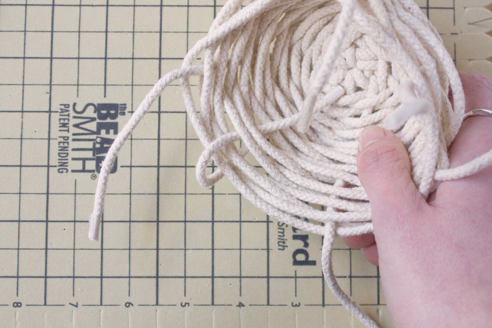DIY Rope Basket Tutorial The stake that finish on the outside are woven through the inside