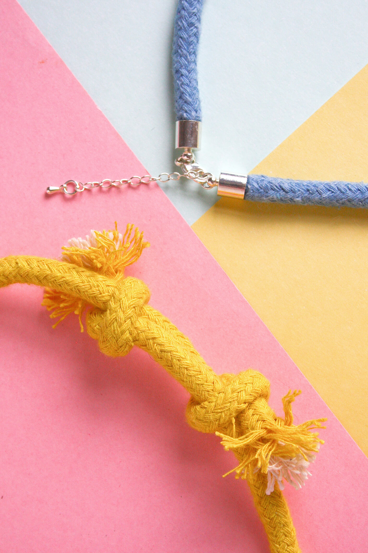 woven necklace kit clasp options, either a silver plated glue on ends, with clasp and extension chain, or a sliding knot on a pastel background