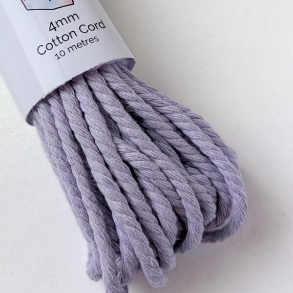 A bundle of 4mm macrame cord in lilac