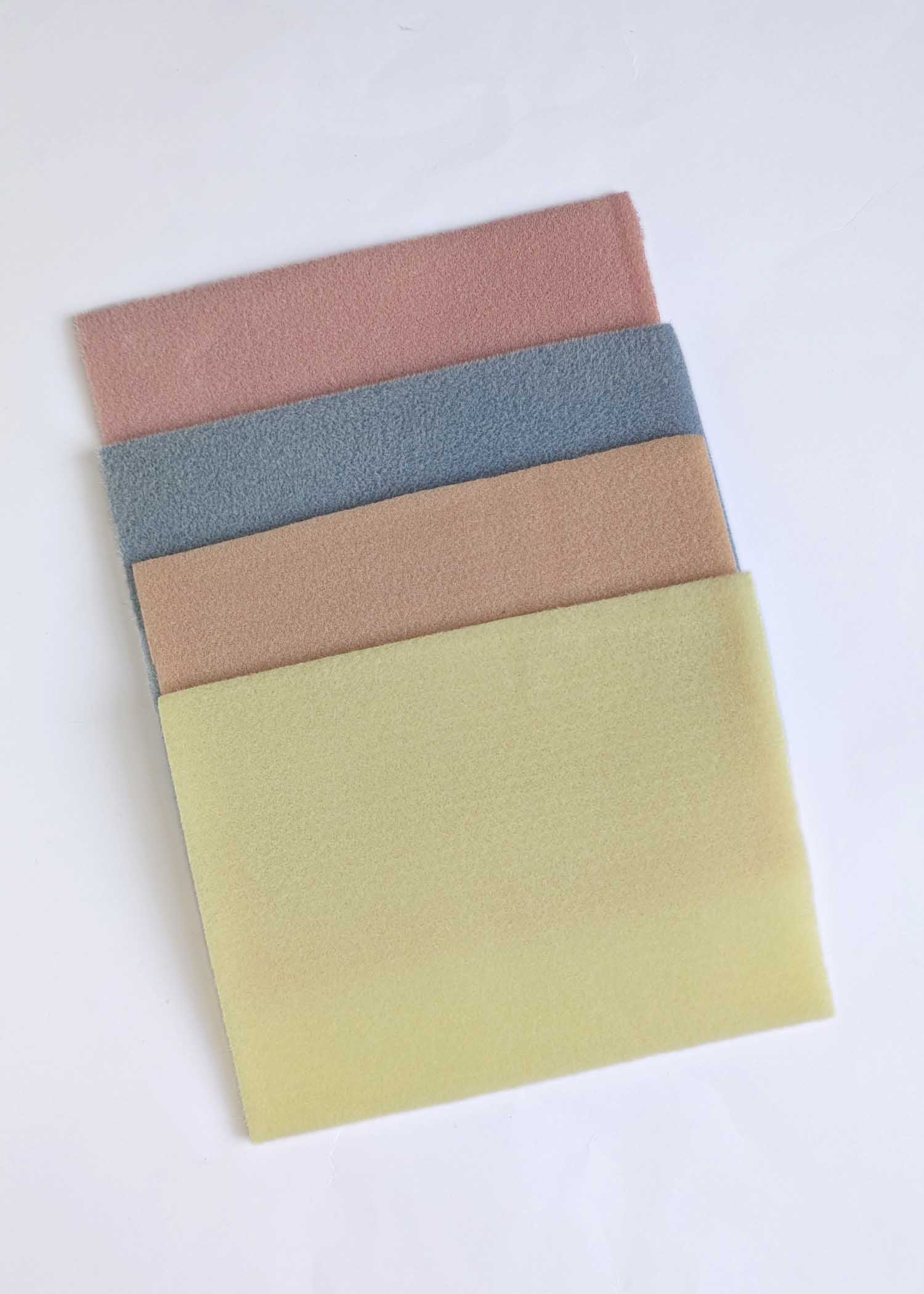 four mall beading mats in pink, blue, peach and yellow