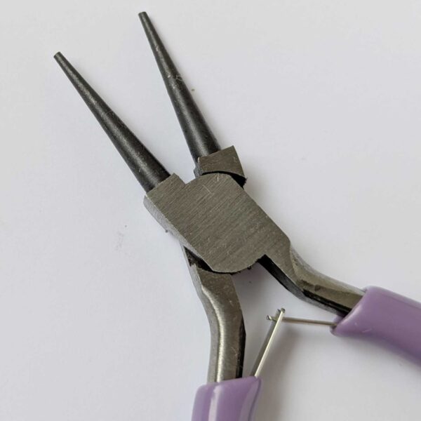 Roundnose pliers with purple handles