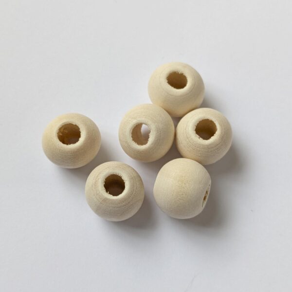 12mm wooden beads, with a natural finish and a large hole for threading into macrame cord