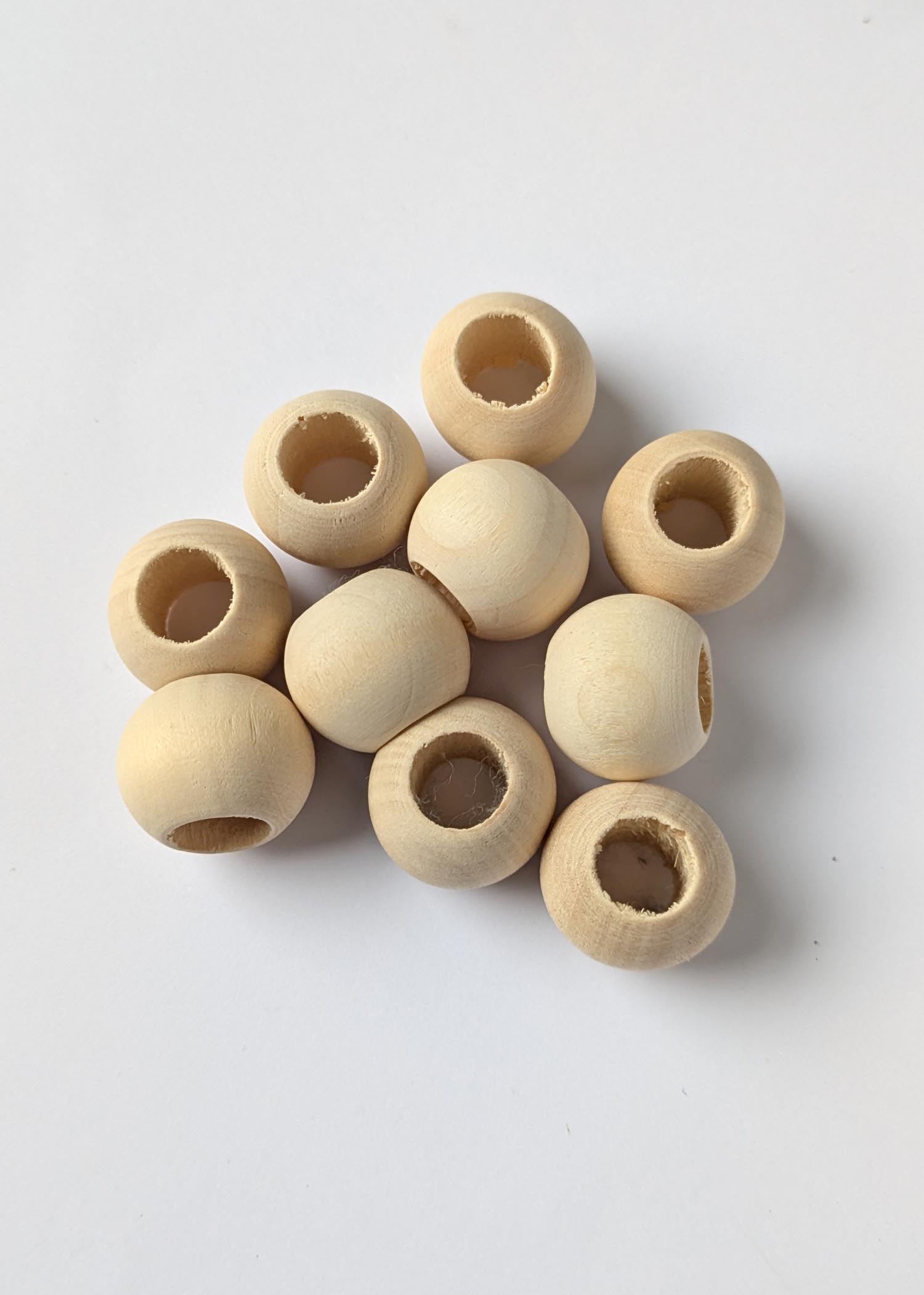 20mm round wooden beads with a large 10mm hole for threading onto macrame cord